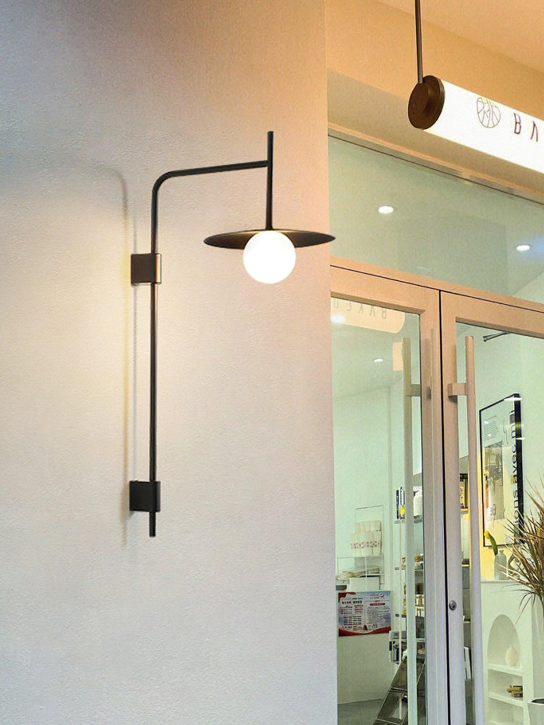 Edan Swing Arm Plug-in Glass Wall Lamp - Neutralighting