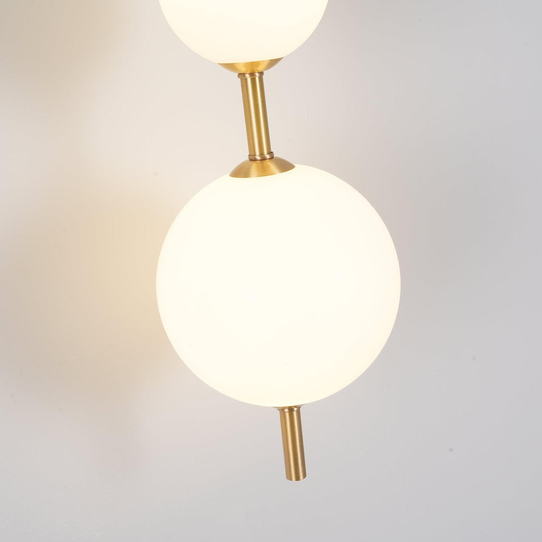 Ilraeia Vertical Globe Plug-in Wall Lamp - Neutralighting