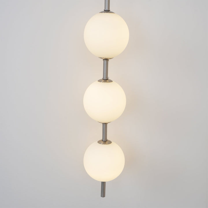 Ilraeia Vertical Globe Plug-in Wall Lamp - Neutralighting