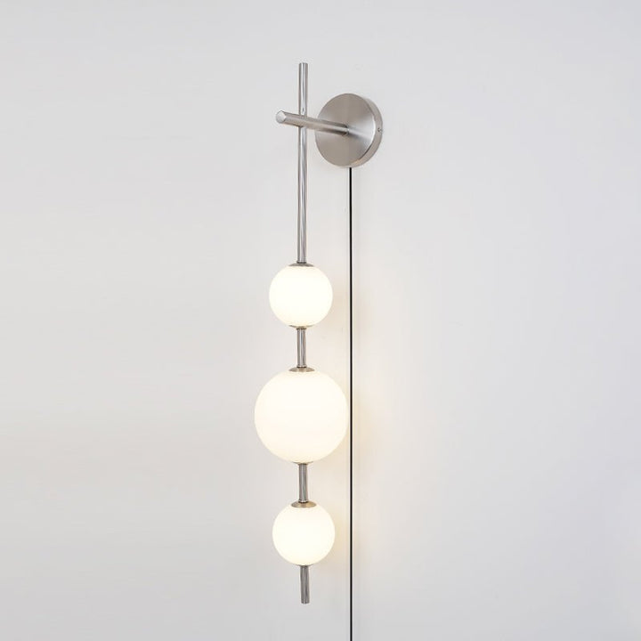 Ilraeia Vertical Globe Plug-in Wall Lamp - Neutralighting