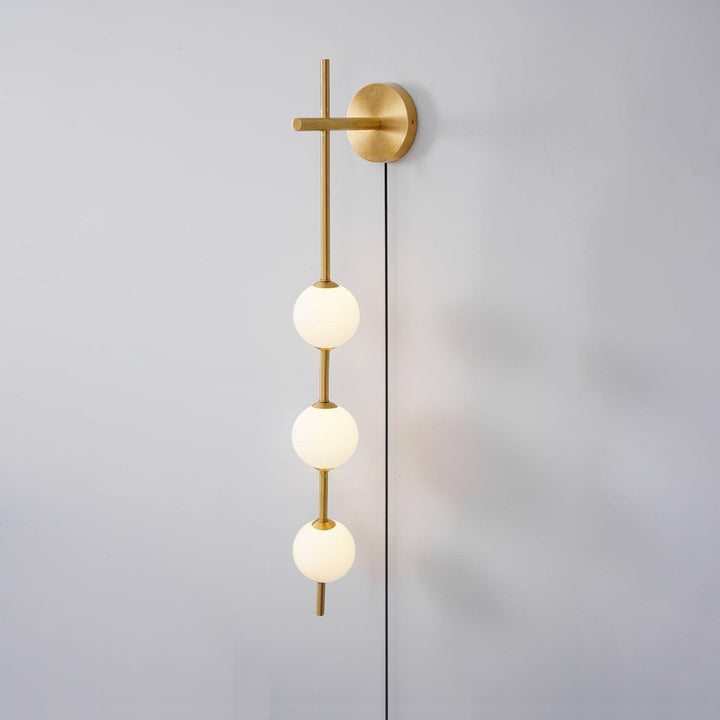 Ilraeia Vertical Globe Plug-in Wall Lamp - Neutralighting