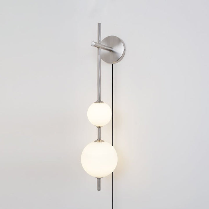 Ilraeia Vertical Globe Plug-in Wall Lamp - Neutralighting
