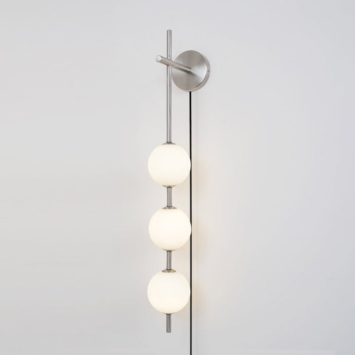 Ilraeia Vertical Globe Plug-in Wall Lamp - Neutralighting